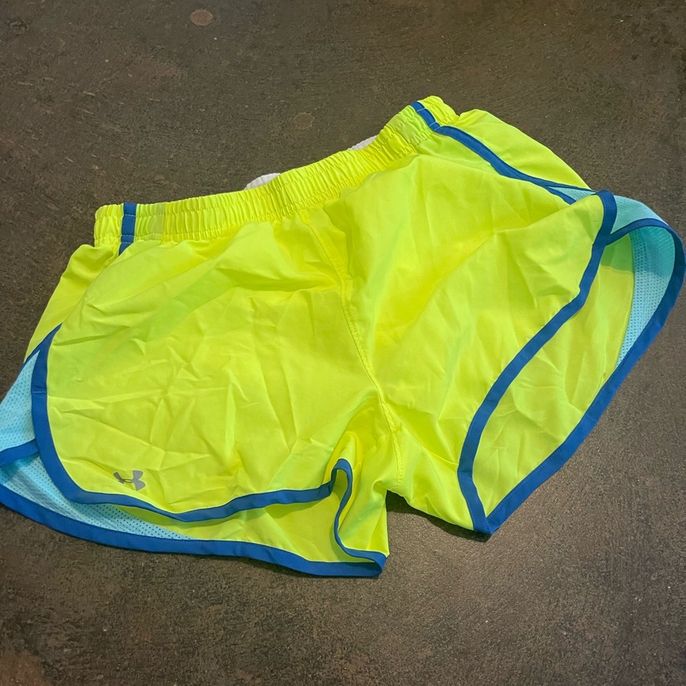 Under armour running shorts, medium.